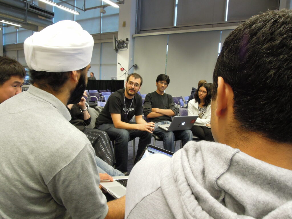 William Eshagh of NASA and the group discuss problem solutions.